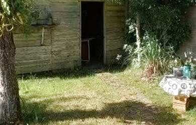 Imagem: A casa possui 3 Dormitórios, 2 Banheiros, 99m² de Área e