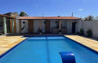 Imagem: A casa possui 3 Dormitórios, 5 Vagas na garagem e Imóvel novo