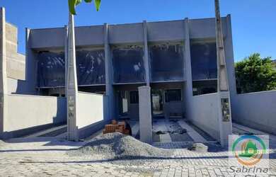 Imagem: A casa possui 2 Dormitórios, 3 Banheiros, 2 Vagas na garagem