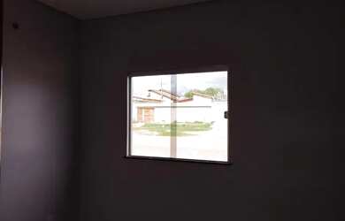 Imagem: A casa possui 2 Dormitórios, 1 Banheiro, 2 Vagas na garagem