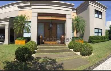 Imagem: A casa em condomínio possui 4 Dormitórios, 5 Banheiros, 4