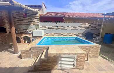 Imagem: A casa possui 2 Dormitórios, 1 Banheiro, 1 Vaga na garagem