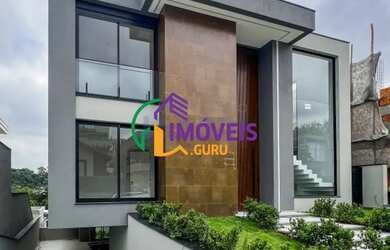 Imagem: A casa em condomínio possui 4 Dormitórios, 4 Banheiros, 4