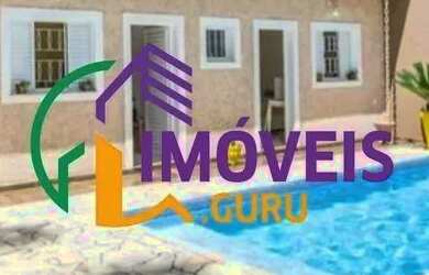 Imagem: A casa possui 5 Dormitórios, 5 Banheiros, 2 Vagas na garagem