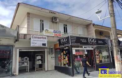 Imagem: A casa possui 3 Dormitórios, 1 Banheiro, 1 Vaga na garagem