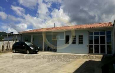 Imagem: A casa à venda possui 4 Dormitórios, 4 Banheiros, 4 Vagas