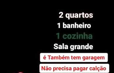 Imagem: A casa possui 2 Dormitórios, 1 Banheiro, 2 Vagas na garagem