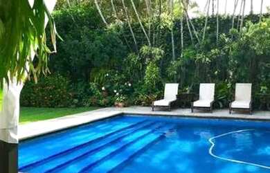 Imagem: A casa em condomínio possui 5 Dormitórios, 1 Banheiro, 4 Vagas