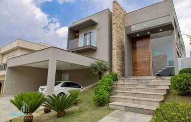 Imagem: A casa em condomínio possui 4 Dormitórios, 5 Banheiros, 4