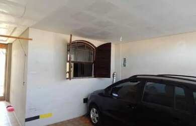 Imagem: A casa possui 3 Dormitórios, 1 Banheiro, 129m² de Área e