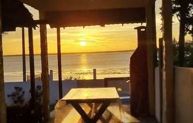 Imagem: A casa possui 3 Dormitórios, 3 Banheiros, 5 Vagas na garagem