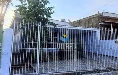 Imagem: A casa possui 4 Dormitórios, 3 Banheiros, 2 Vagas na garagem