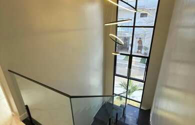 Imagem: A casa em condomínio possui 4 Dormitórios, 4 Banheiros, 2