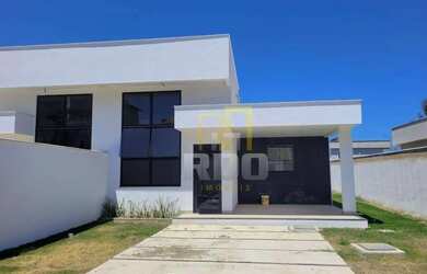 Imagem: A casa possui 3 Dormitórios, 2 Banheiros, 4 Vagas na garagem