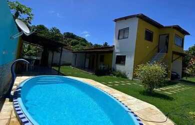 Imagem: A casa possui 4 Dormitórios, 3 Banheiros, 3 Vagas na garagem