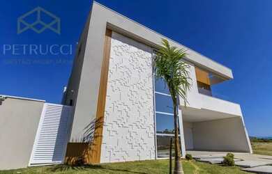 Imagem: A casa em condomínio possui 4 Dormitórios, 5 Banheiros, 4