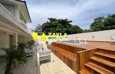 Imagem: A casa em condomínio possui 4 Dormitórios, 5 Banheiros, 3