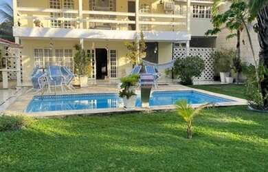 Imagem: A casa em condomínio possui 5 Dormitórios, 5 Banheiros, 4