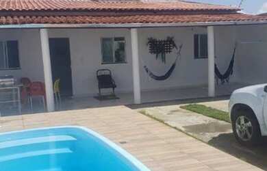 Imagem: A casa possui 3 Dormitórios, 5 Vagas na garagem e está localizado