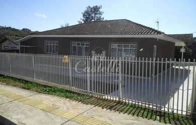 Imagem: A casa possui 3 Dormitórios, 2 Banheiros, 1 Vaga na garagem