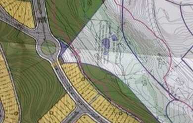 Imagem: O terreno à venda possui e está localizado em Loteamento