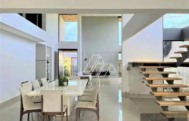 Imagem: A casa possui 5 Dormitórios, 5 Banheiros, 4 Vagas na garagem