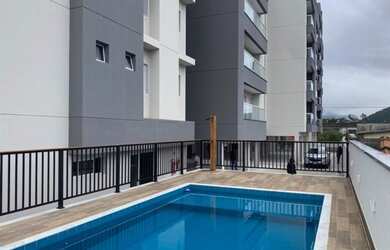 Imagem: O apartamento possui 3 Dormitórios, 2 Banheiros, 2 Vagas na