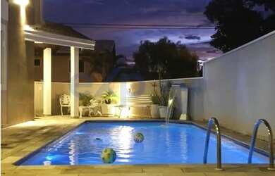 Imagem: A casa em condomínio possui 4 Dormitórios, 3 Banheiros, 2