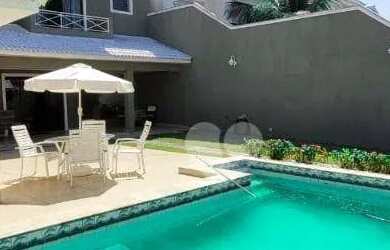 Imagem: A casa em condomínio possui 5 Dormitórios, 5 Banheiros, 4