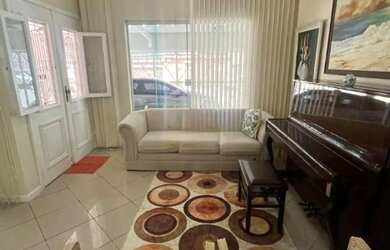 Imagem: A casa possui 3 Dormitórios, 5 Banheiros, 4 Vagas na garagem