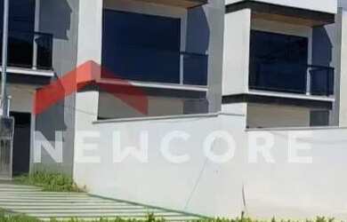 Imagem: A casa possui 3 Dormitórios, 3 Banheiros, 2 Vagas na garagem