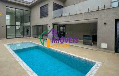 Imagem: A casa em condomínio à venda possui 4 Dormitórios, 5 Banheiros