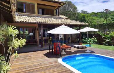 Imagem: A casa possui 3 Dormitórios, 4 Banheiros, 4 Vagas na garagem