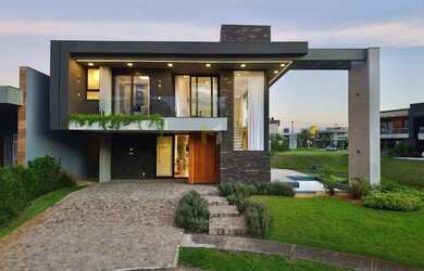 Imagem: A casa em condomínio possui 5 Dormitórios, 5 Banheiros, 2