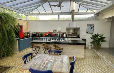 Imagem: A casa em condomínio possui 4 Dormitórios, 5 Banheiros, 4