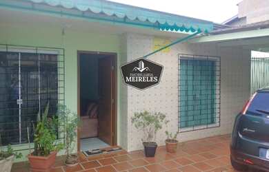 Imagem: A casa possui 2 Dormitórios, 1 Banheiro, 1 Vaga na garagem