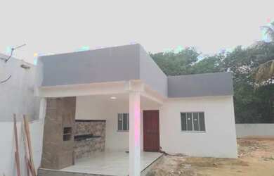 Imagem: A casa possui 2 Dormitórios, 1 Banheiro, 2 Vagas na garagem