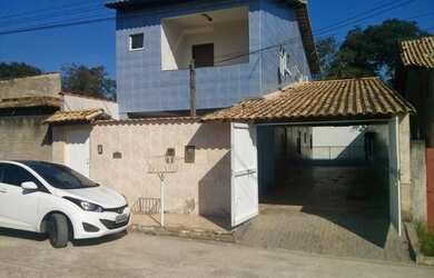 Imagem: A casa possui 2 Dormitórios, 2 Banheiros, 2 Vagas na garagem