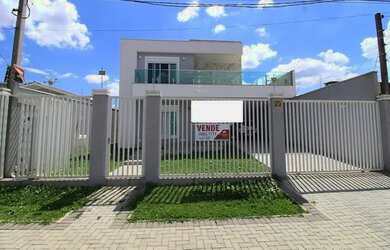 Imagem: A casa possui 3 Dormitórios, 4 Banheiros, 5 Vagas na garagem