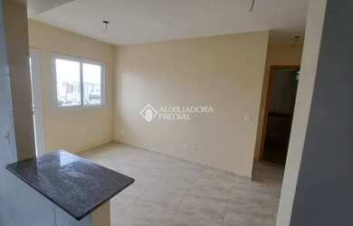 Imagem: O apartamento possui 1 Dormitório, 1 Banheiro, 1 Vaga na garagem