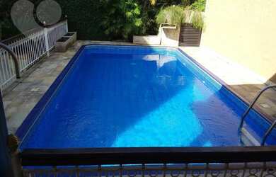 Imagem: A casa possui 3 Dormitórios, 3 Banheiros, 2 Vagas na garagem