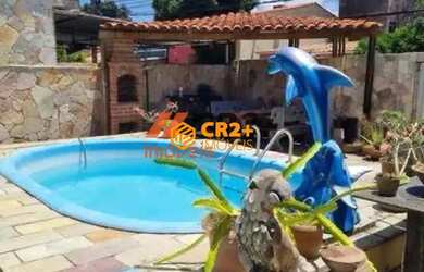 Imagem: A casa possui 4 Dormitórios, 5 Banheiros, 2 Vagas na garagem