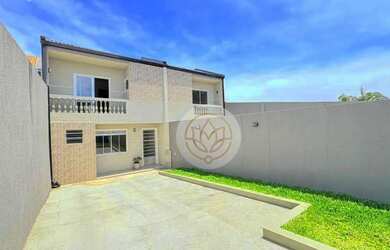 Imagem: A casa possui 2 Dormitórios, 2 Banheiros, 3 Vagas na garagem