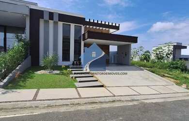 Imagem: A casa possui 3 Dormitórios, 4 Banheiros, 2 Vagas na garagem