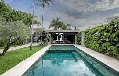 Imagem: A casa em condomínio possui 5 Dormitórios, 5 Banheiros, 5