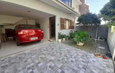 Imagem: A casa à venda possui 4 Dormitórios, 2 Banheiros, 2 Vagas