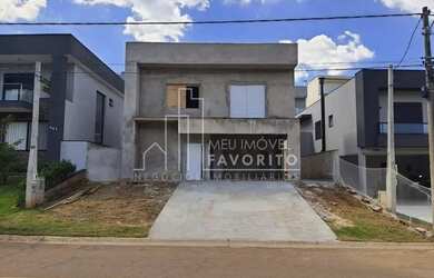 Imagem: A casa possui 5 Dormitórios, 5 Banheiros, 4 Vagas na garagem