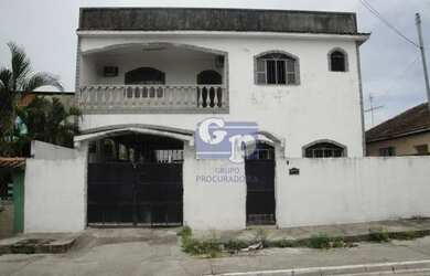 Imagem: A casa possui 3 Dormitórios, 2 Banheiros, 4 Vagas na garagem