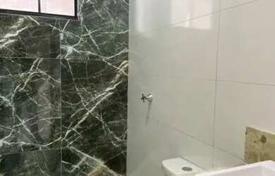 Imagem: A casa possui 3 Dormitórios, 3 Banheiros, 82m² de Área e