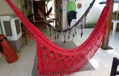 Imagem: A casa possui 2 Dormitórios, 1 Banheiro, 2 Vagas na garagem